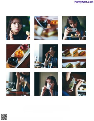 A woman sitting at a table with a tray of food.